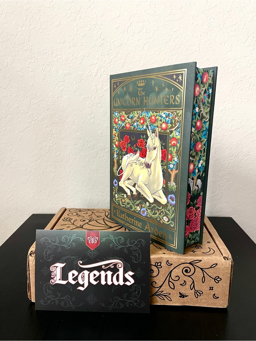 FairyLoot June 2026 Adult Fantasy box The Unicorn Hunters by Katherine Arden
